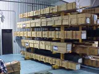 Roll-R-Racks in use in a warehouse.
